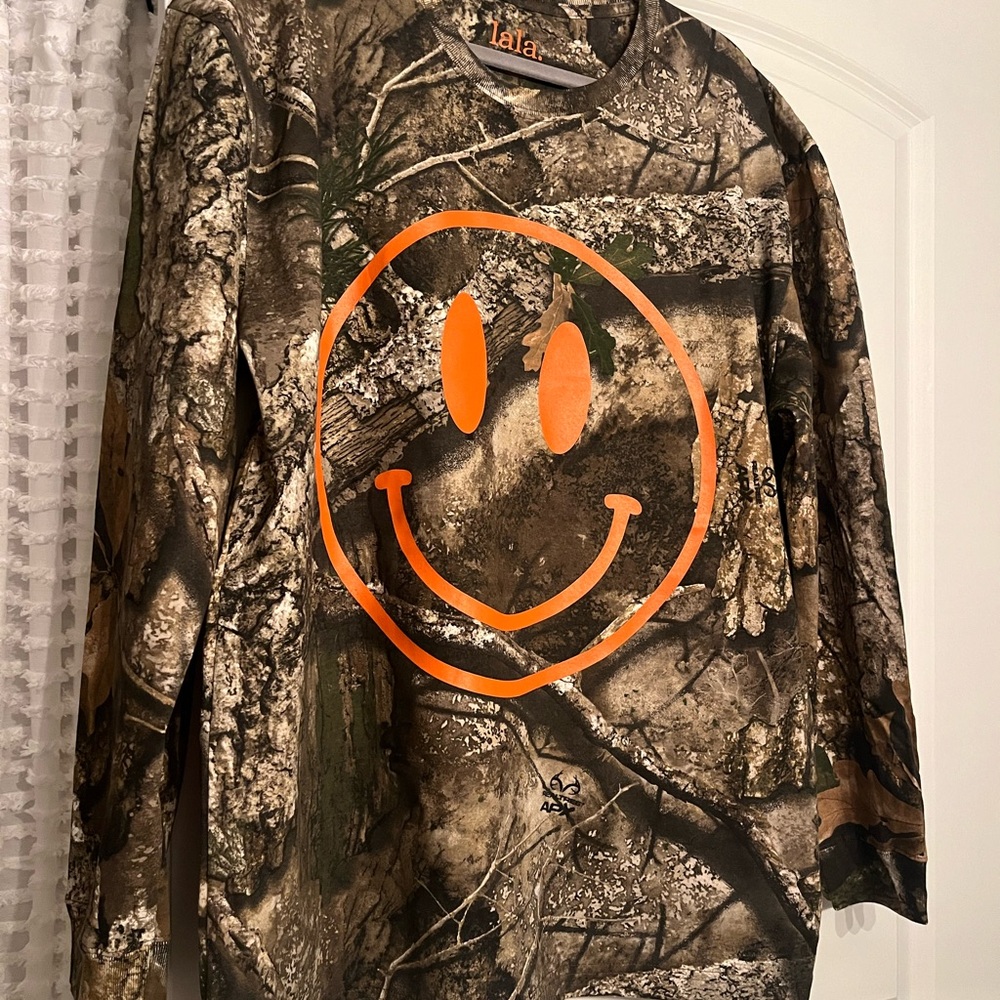 Dressed in LALA Camo Long Sleeve The World Needs Your Magic Shirt